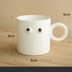 Mug en céramique “Gros Yeux” avec assiette – Style nordique